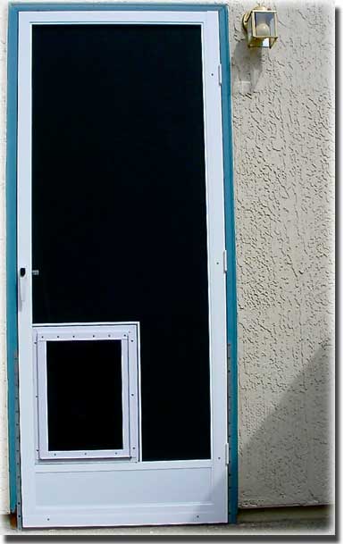 Black Screen Door with white trim and small pet door at the bottom