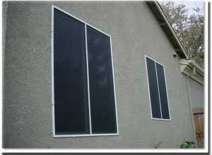 Window Sun Screens on side windows of a home