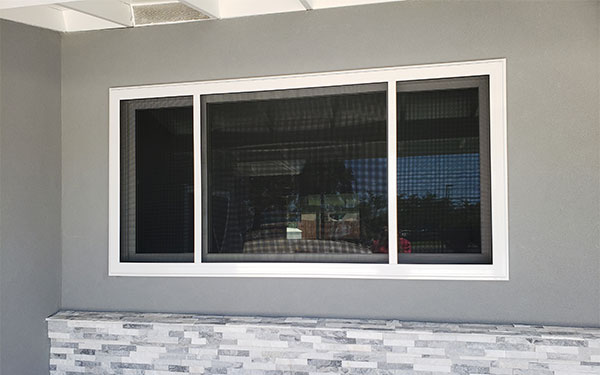 three security window screens with white trim