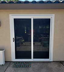Two black security doors with white trim