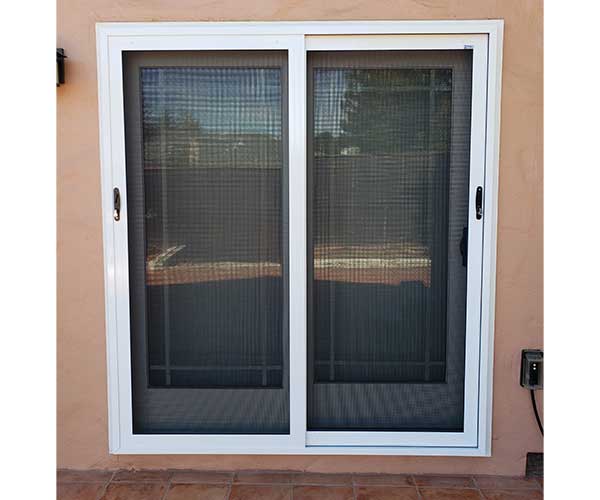 Two sliding security doors with white trim